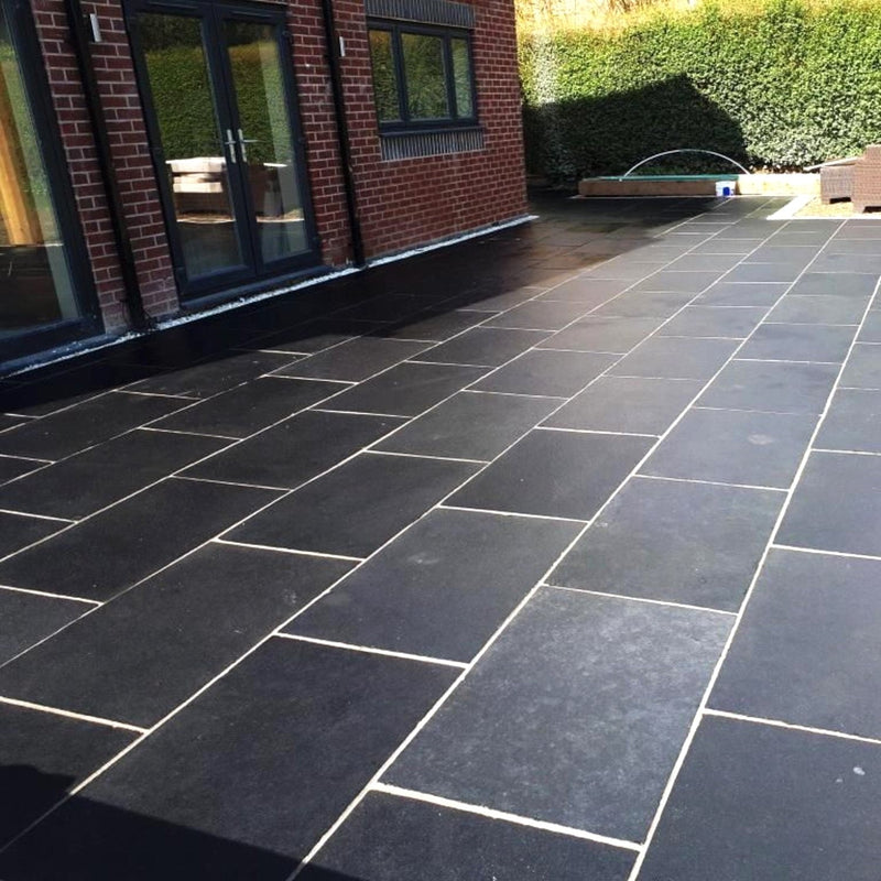 Load image into Gallery viewer, Kota Black Limestone Paving - 900 x 600 x 22mm - Sawn & Riven