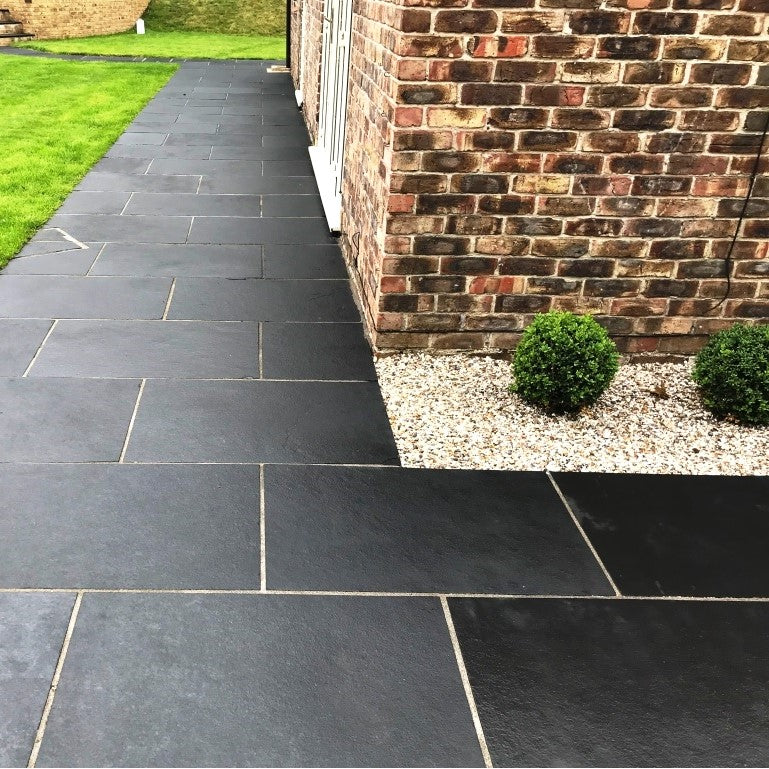 Load image into Gallery viewer, Kota Black Limestone Paving - 900 x 600 x 22mm - Sawn &amp; Riven
